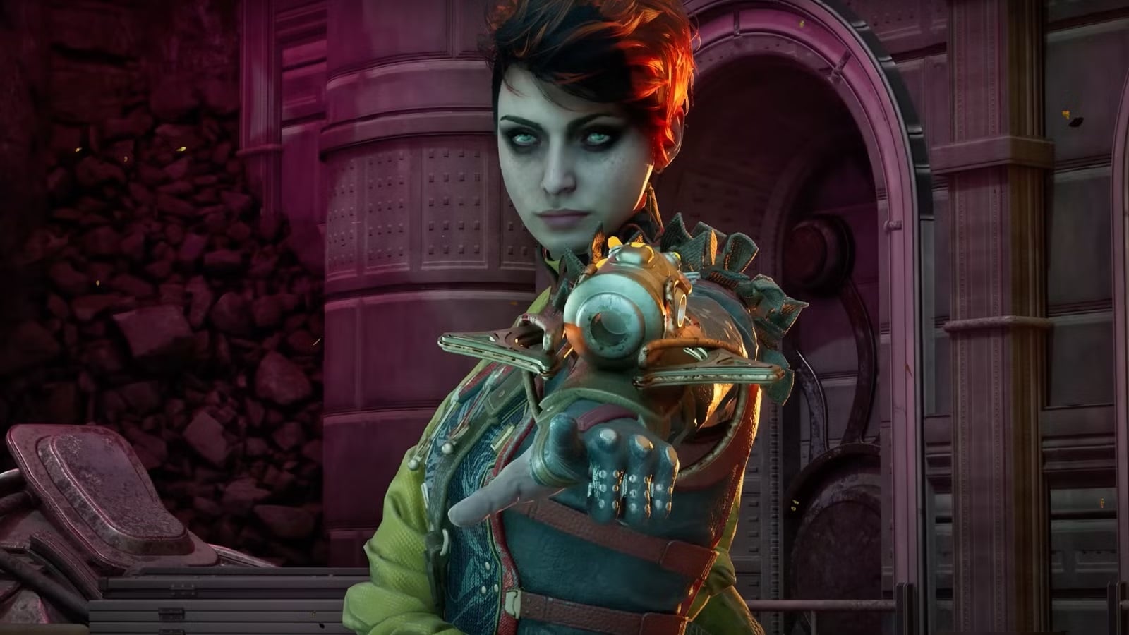 A woman holds up a rocket launcher on her wrist.