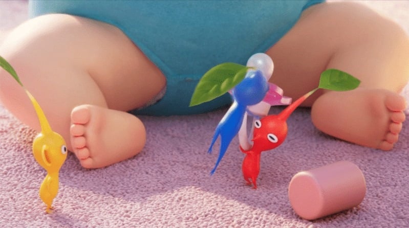 Pikmin standing in front of a sitting baby