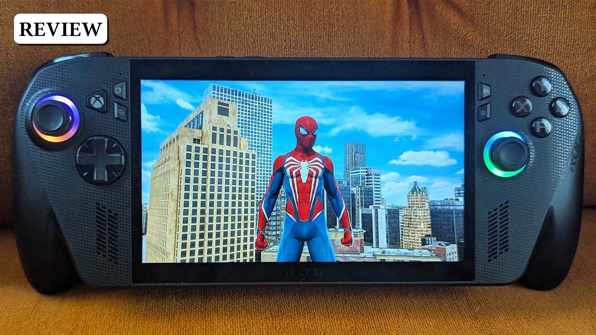 A Rog Xbox Ally X sits on a chair.