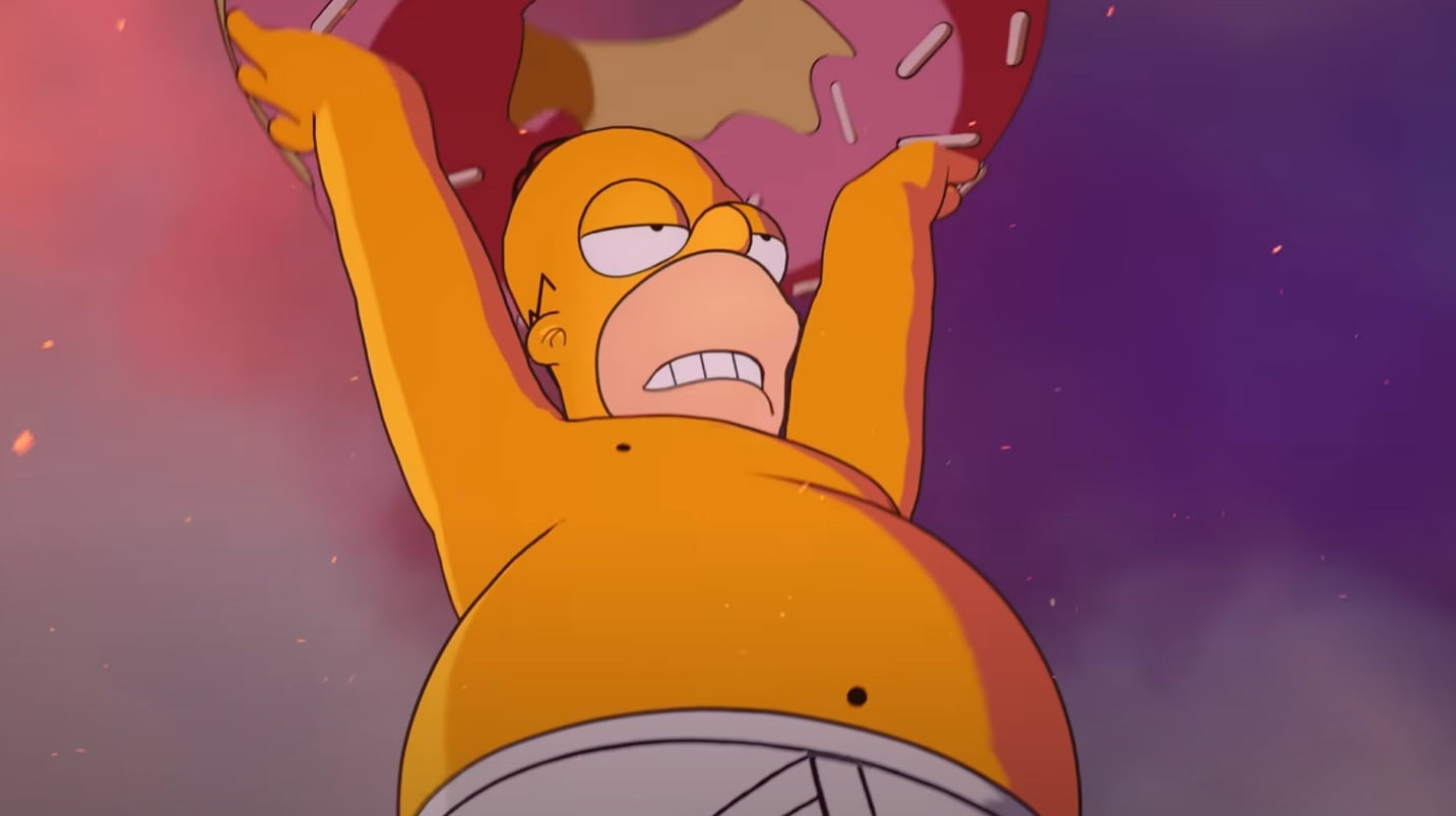 Homer lifts a giant donut.