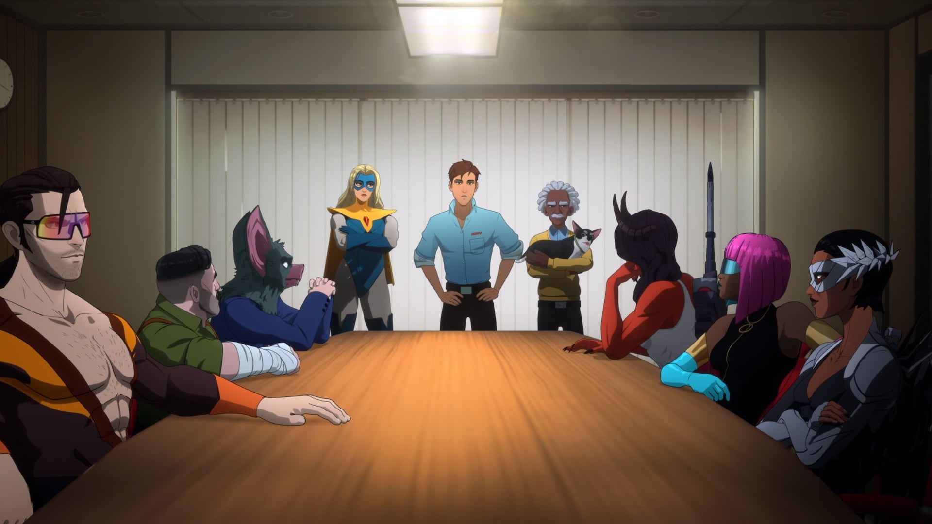 The cast of Dispatch sits around a meeting table.