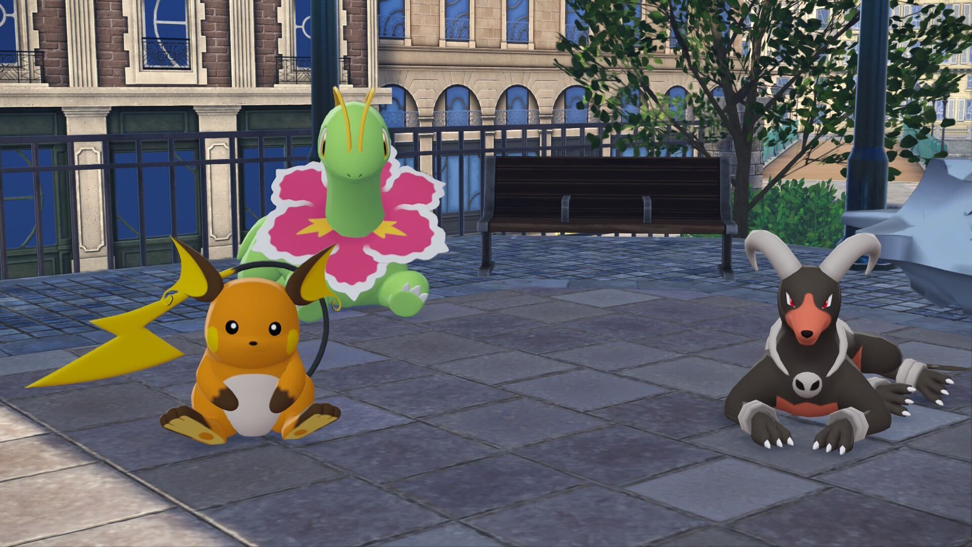 Raichu, Meganium, and Houndoom sit on the ground.