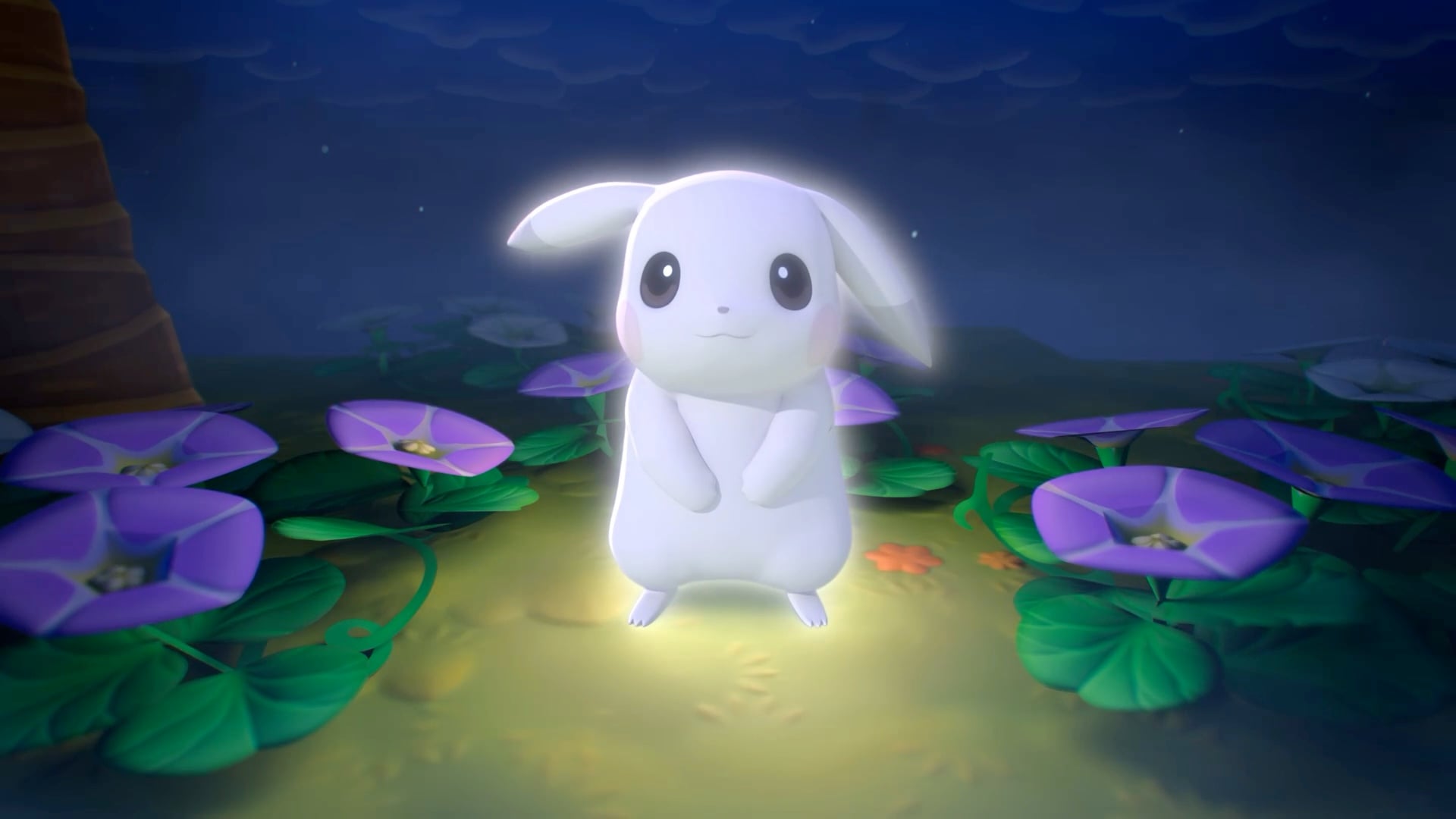 A white Pikachu looks at the camera while standing in a forest.