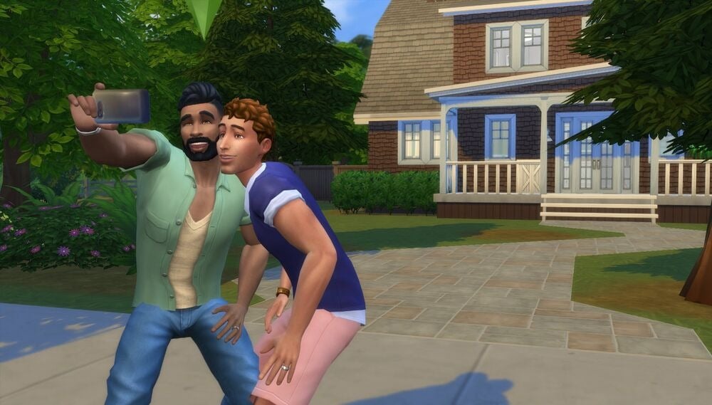 A gay couple in the Sims taking a selfie in front of their house.