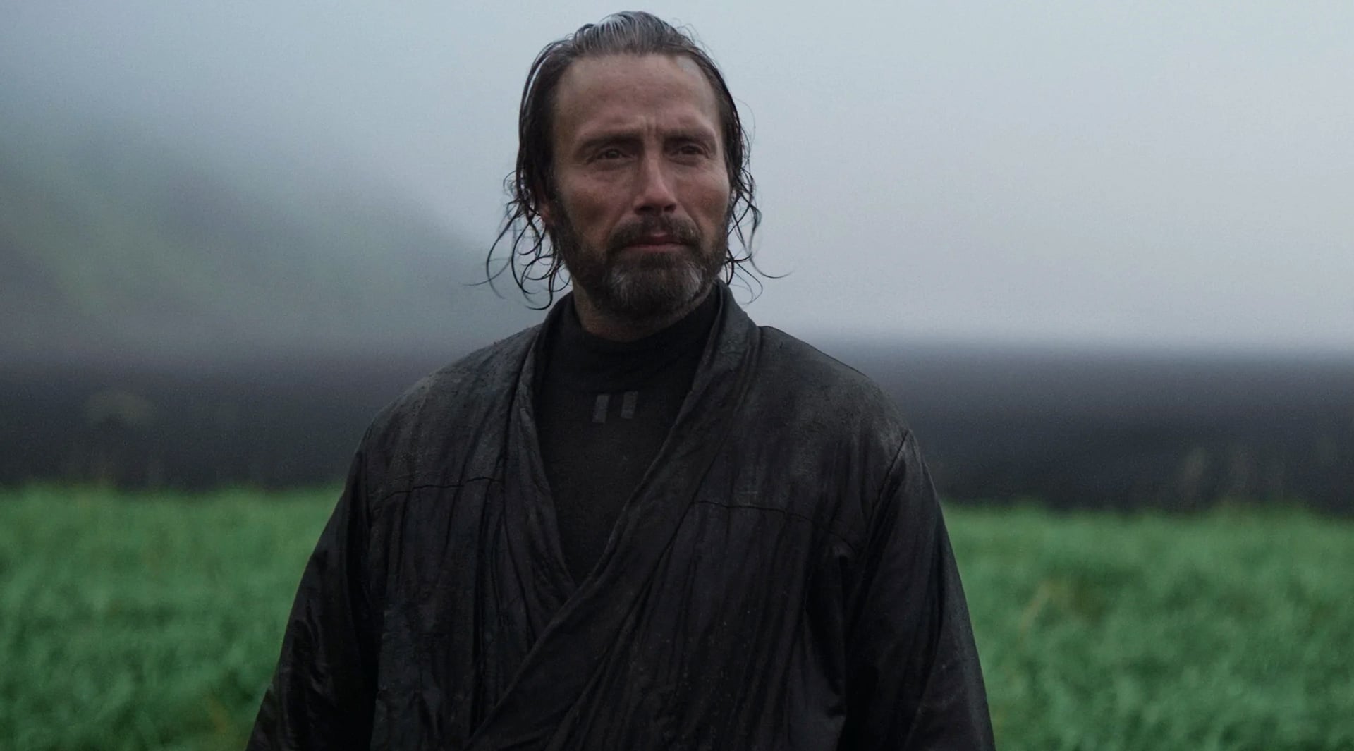 Galen Erso in Rogue One talks to someone off-screen.