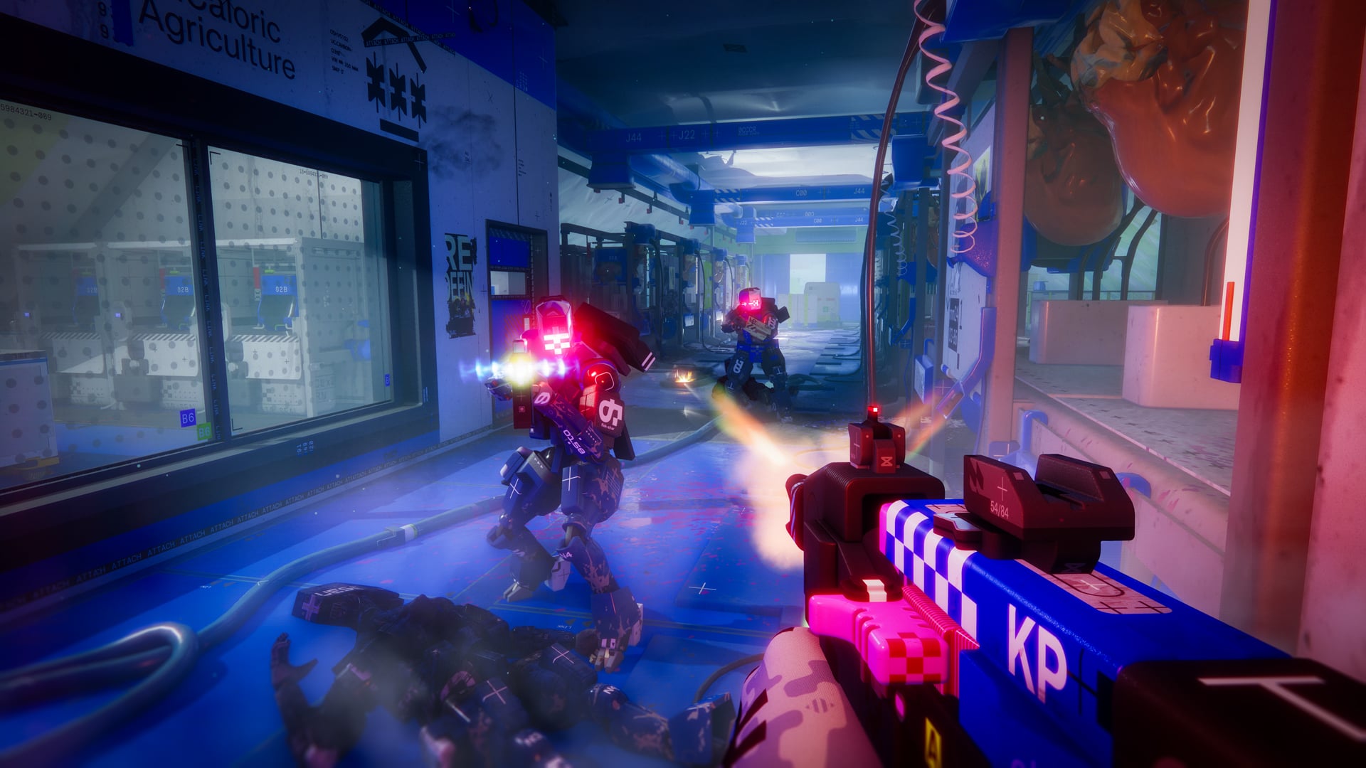 A player shoots down a corridor at robots.