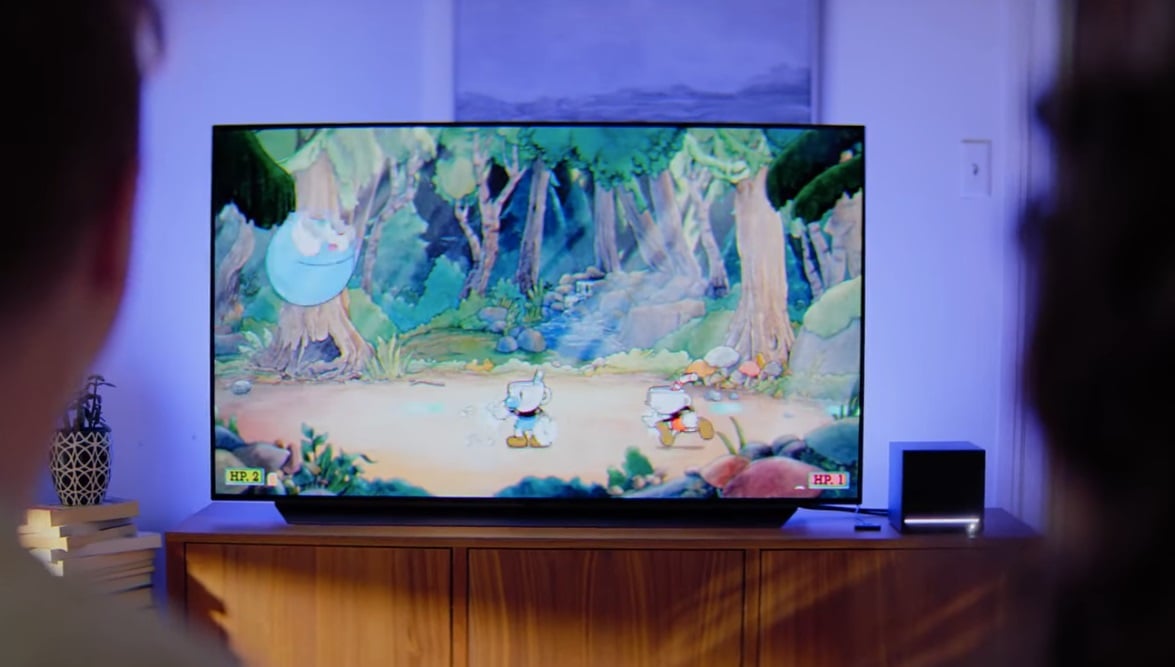 A TV displays Cuphead.
