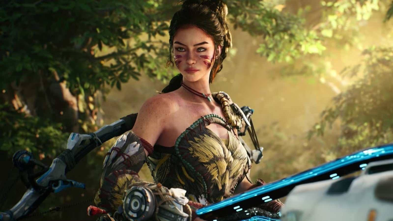 A woman appears in a jungle with a weapon.