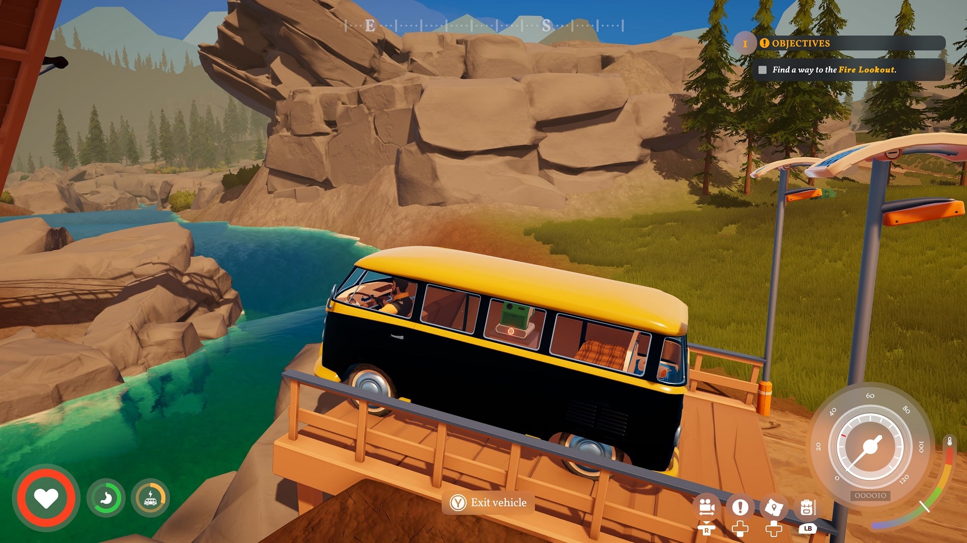 A VW van gets stuck at a river.