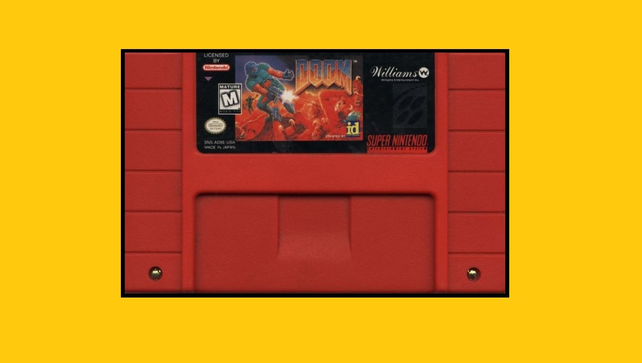 The SNES cartridge for Doom appears in front of a yellow background.
