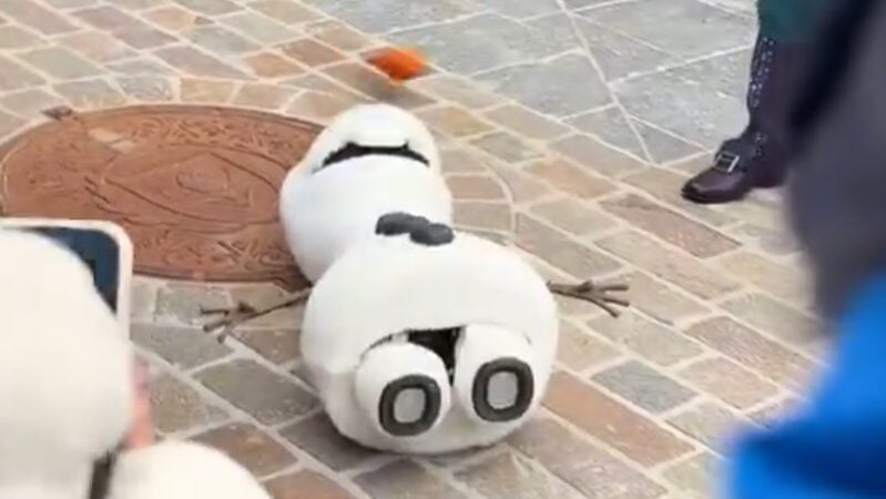 Olaf falls on the ground.