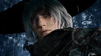 A man wears a hat in the rain.